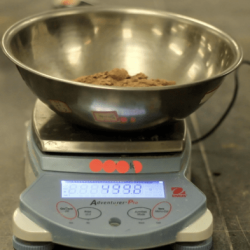 A sample of brass weighing 1.203 grams was analyzed